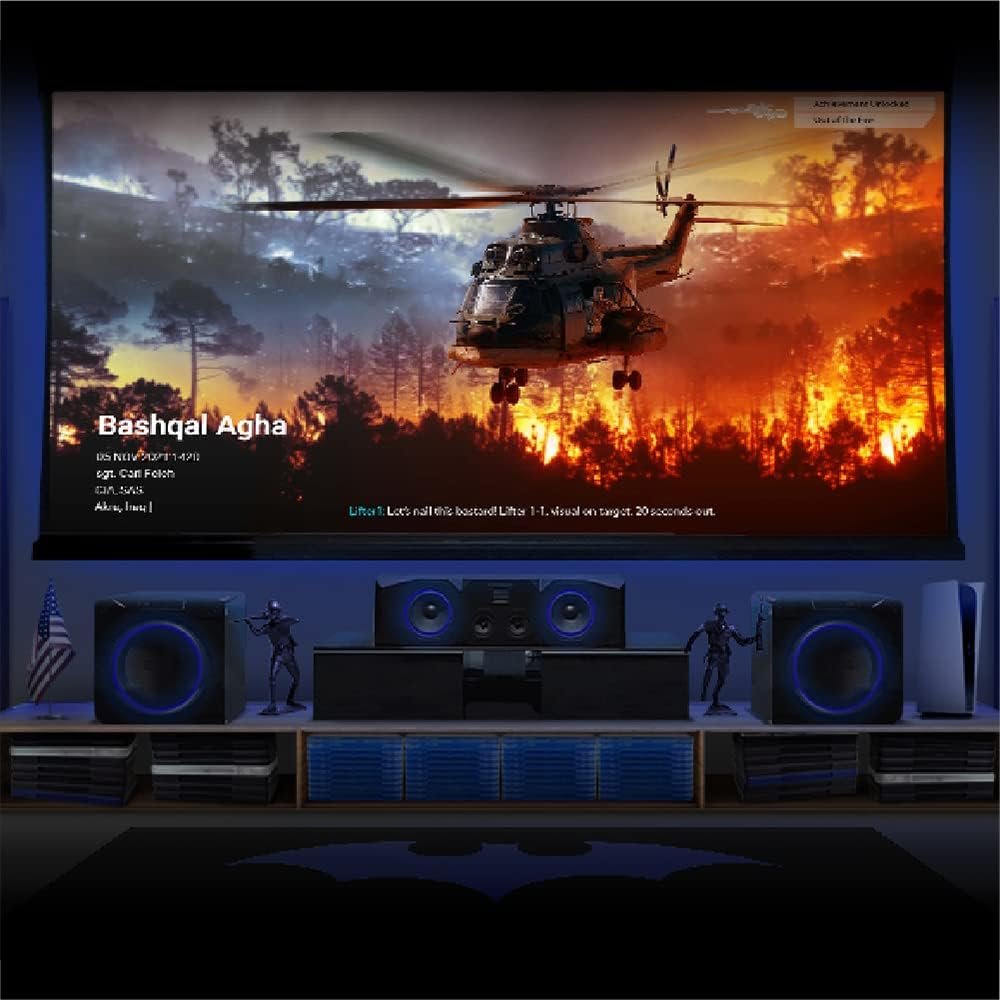 A BenQ TK700 projector box sits on a store shelf with a price tag of $1,499, surrounded by gaming consoles and a large screen displaying a racing game.