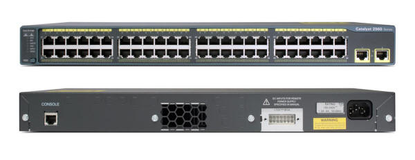 A network engineer configuring the Cisco Catalyst 2960-48TT-L via a laptop in a server room, with organized cables connected to the switch.