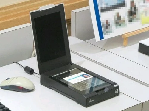 Front desk using Fujitsu fi-65F for passport scanning

